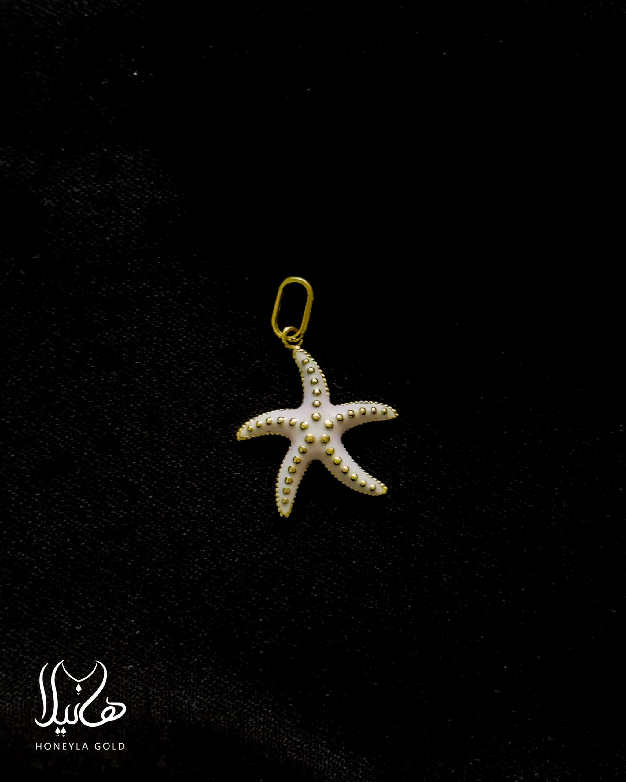 پلاک طلا طرح ستاره دریایی کالباسی پلاک طلا طرح ستاره دریایی کالباسی